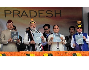 The Prime Minister, Shri Narendra Modi releasing the souvenir to mark 29th Statehood Day, at Itanagar, in Arunachal Pradesh on February 20, 2015